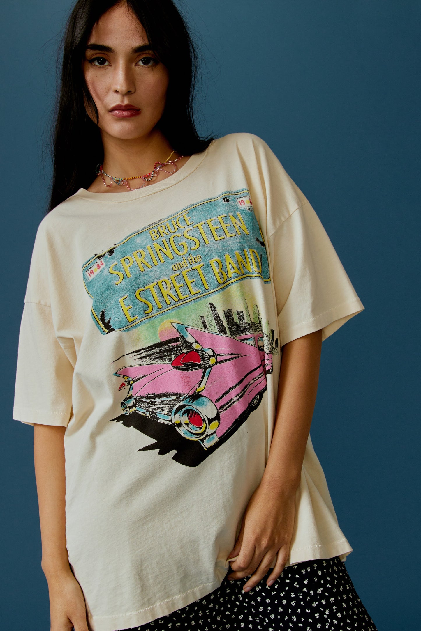 Model with Straight Hair wearing a Bruce Springsteen Graphic Tee