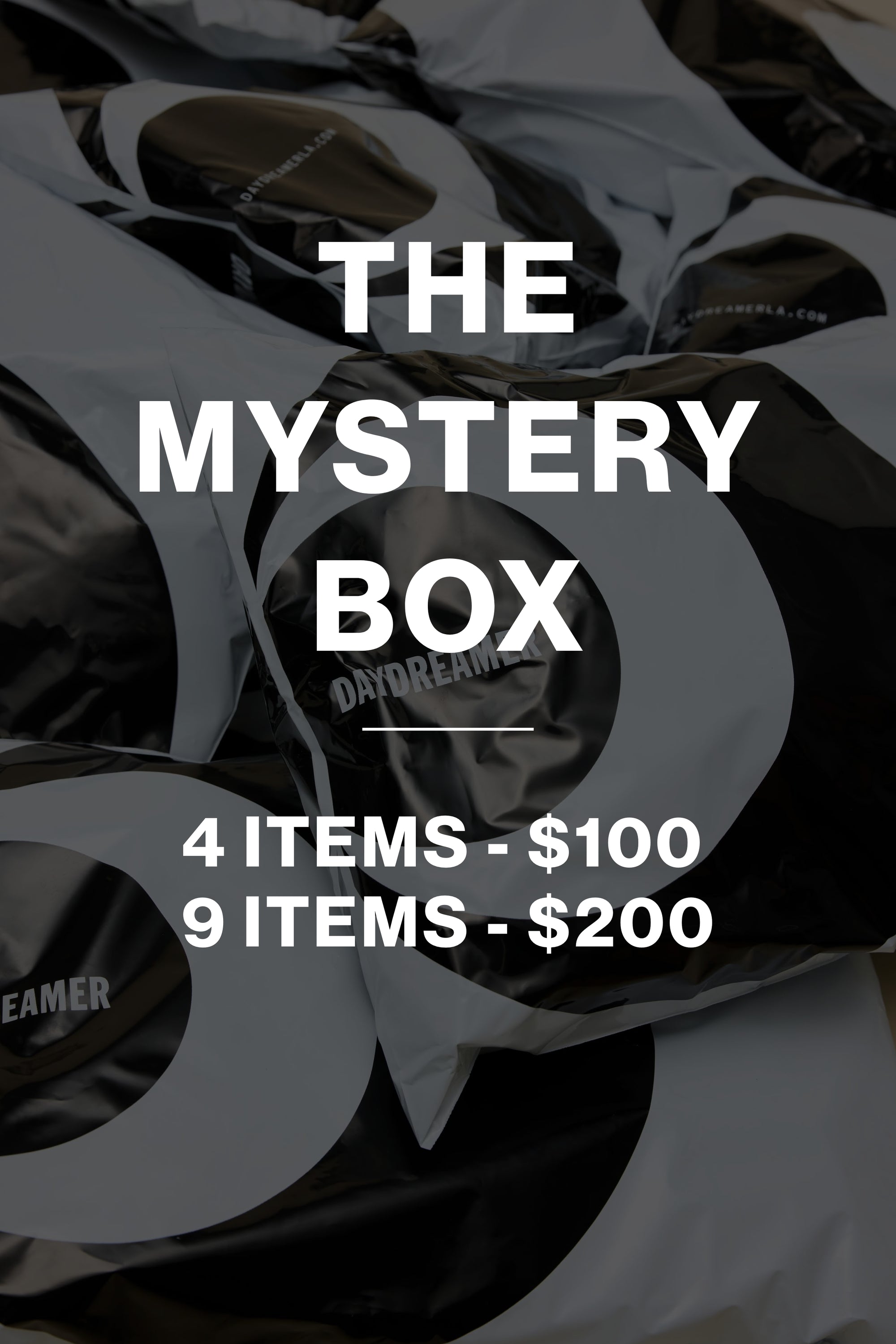 Stack of mystery boxes with text indicating pricing for different quantities.