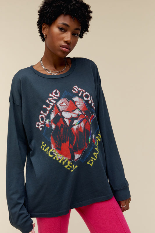 Model wearing a vintage black Rolling Stones long sleeve tee with graphic artwork inspired by the 'Hackney Diamonds' album