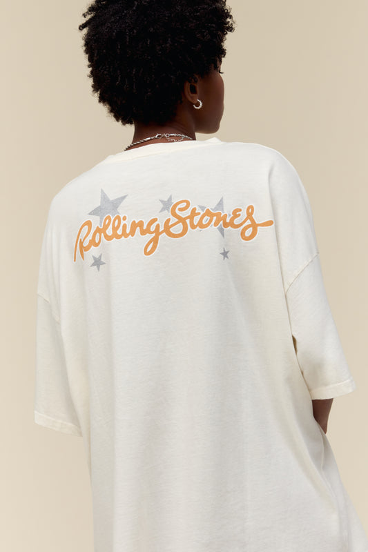 Model wearing an oversized Rolling Stones graphic tee in dirty white