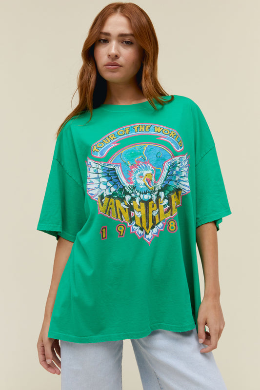  A model featuring a mint green tee with "Tour of the World" across the chest area and a graphic of the Van Halen tour below 