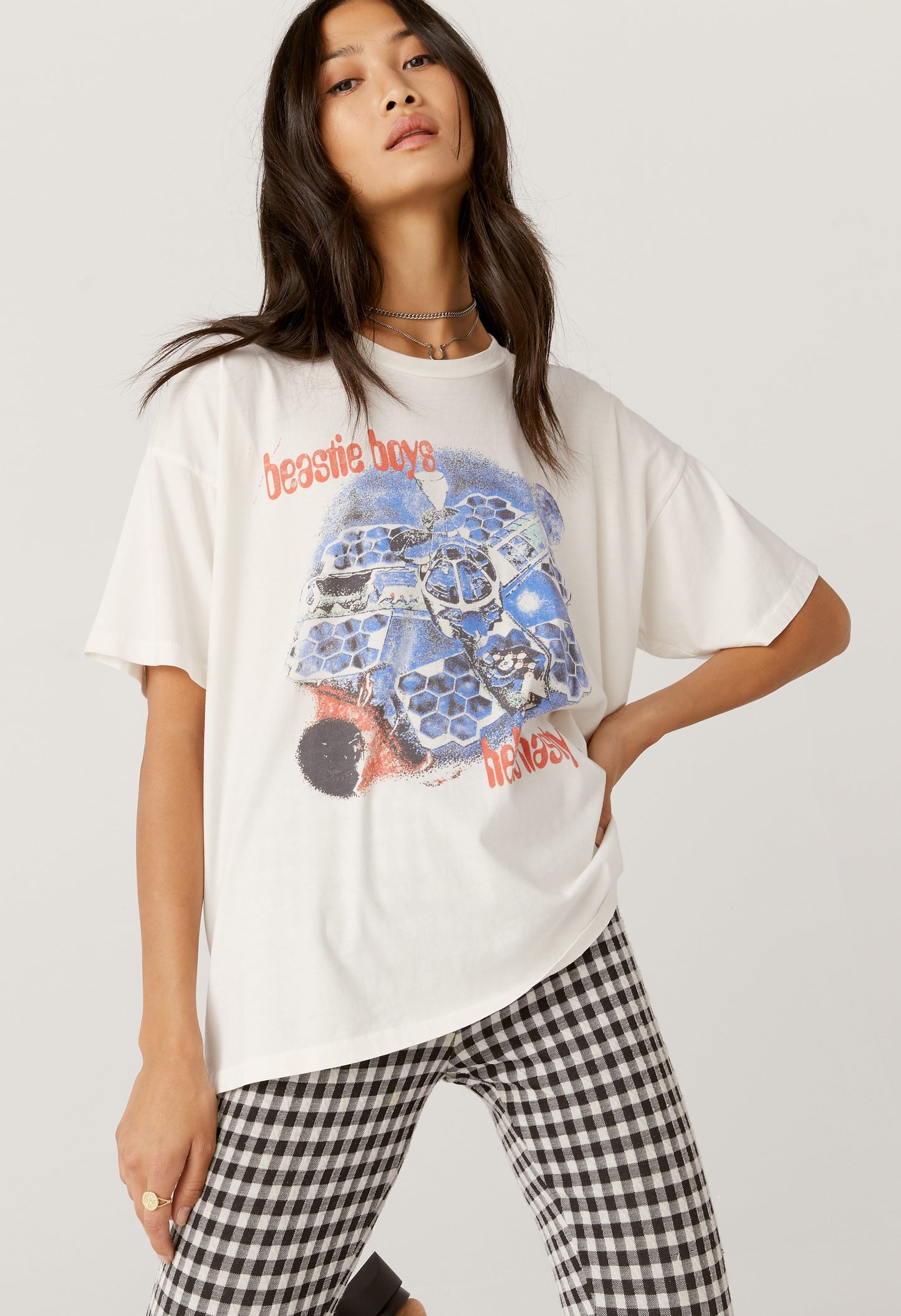 Model wearing a Beastie Boys 'Hello Nasty' tour graphic tee in vintage white