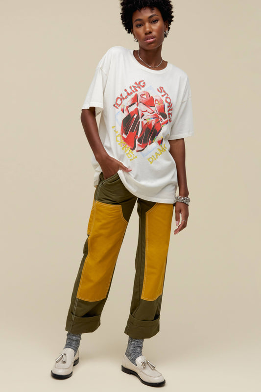 Model wearing a vintage white Rolling Stones graphic tee with 'Hackney Diamonds' inspired artwork