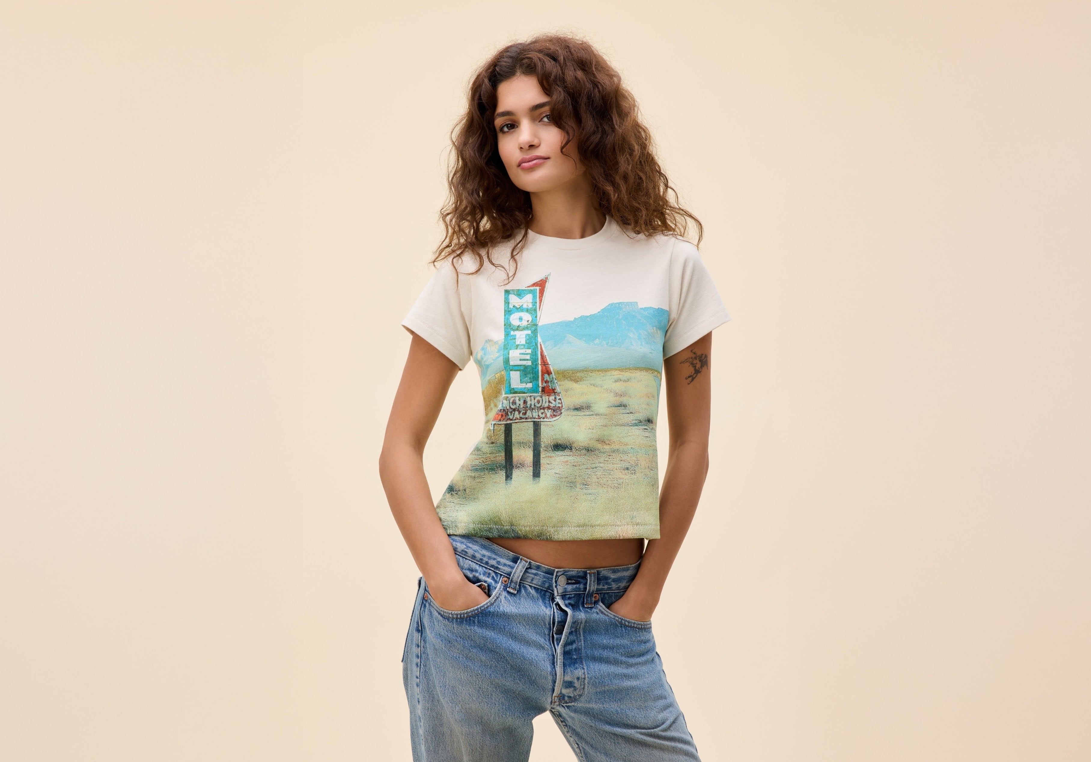 Brunette Model with graphic tee in studio