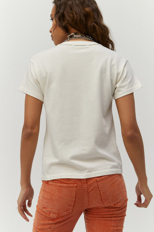Dark curly-haired model featuring a white tee designed with a landscape graphic 