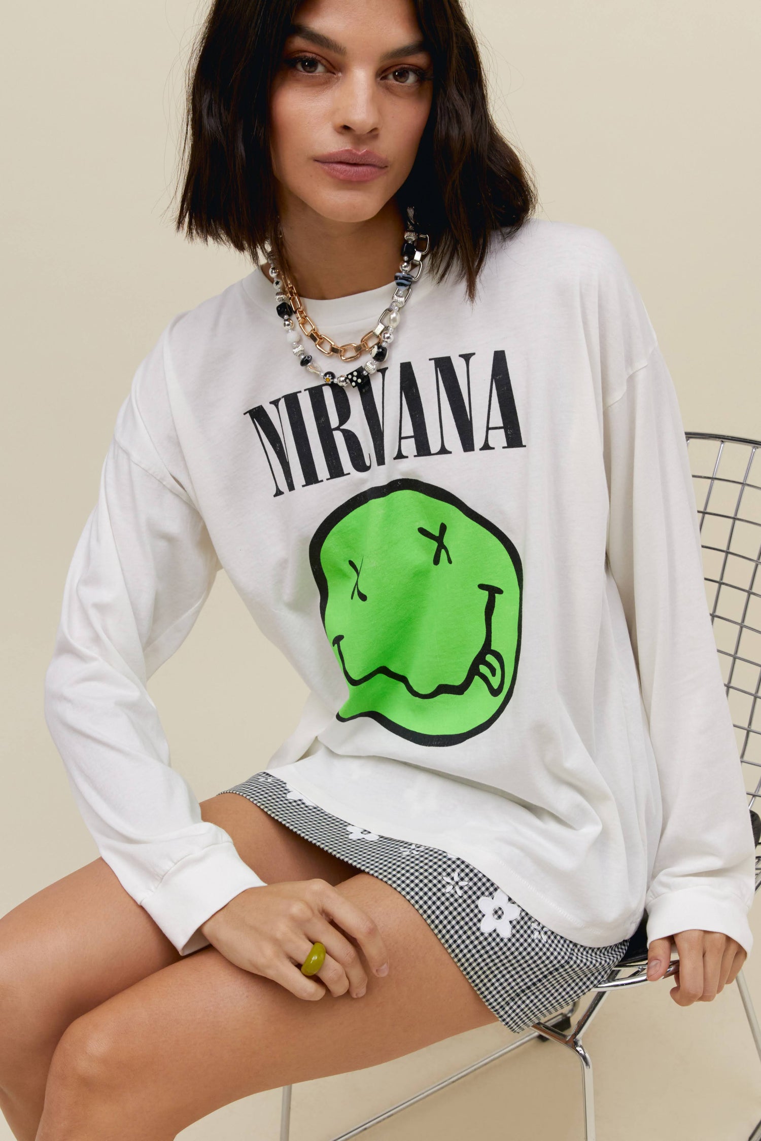 green and white Nirvana shirt